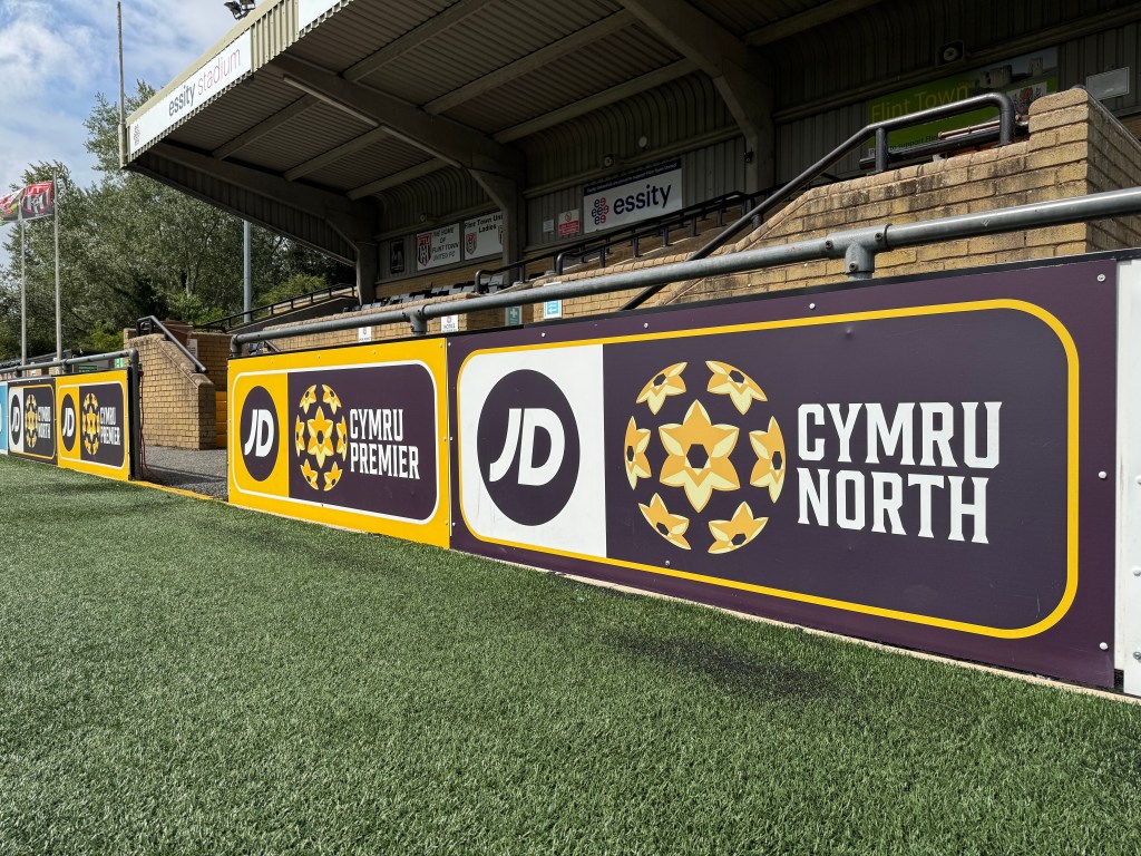 JD Cymru Premier and Cymru North advertising. Can Flint avoid relegation to reap the initial league benefits? - taken by Daniel Moffat