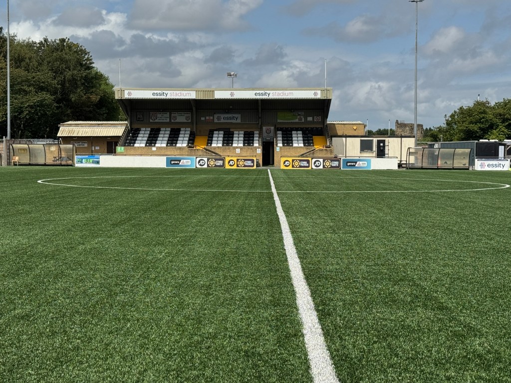 Flint Town United's main stand and dugouts - taken by Daniel Moffat